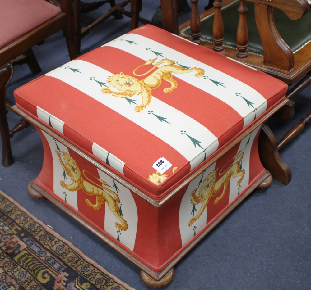 A Victorian mahogany ottoman, re-upholstered with a lion and spearhead fabric, W.62cm D.62cm H.44cm